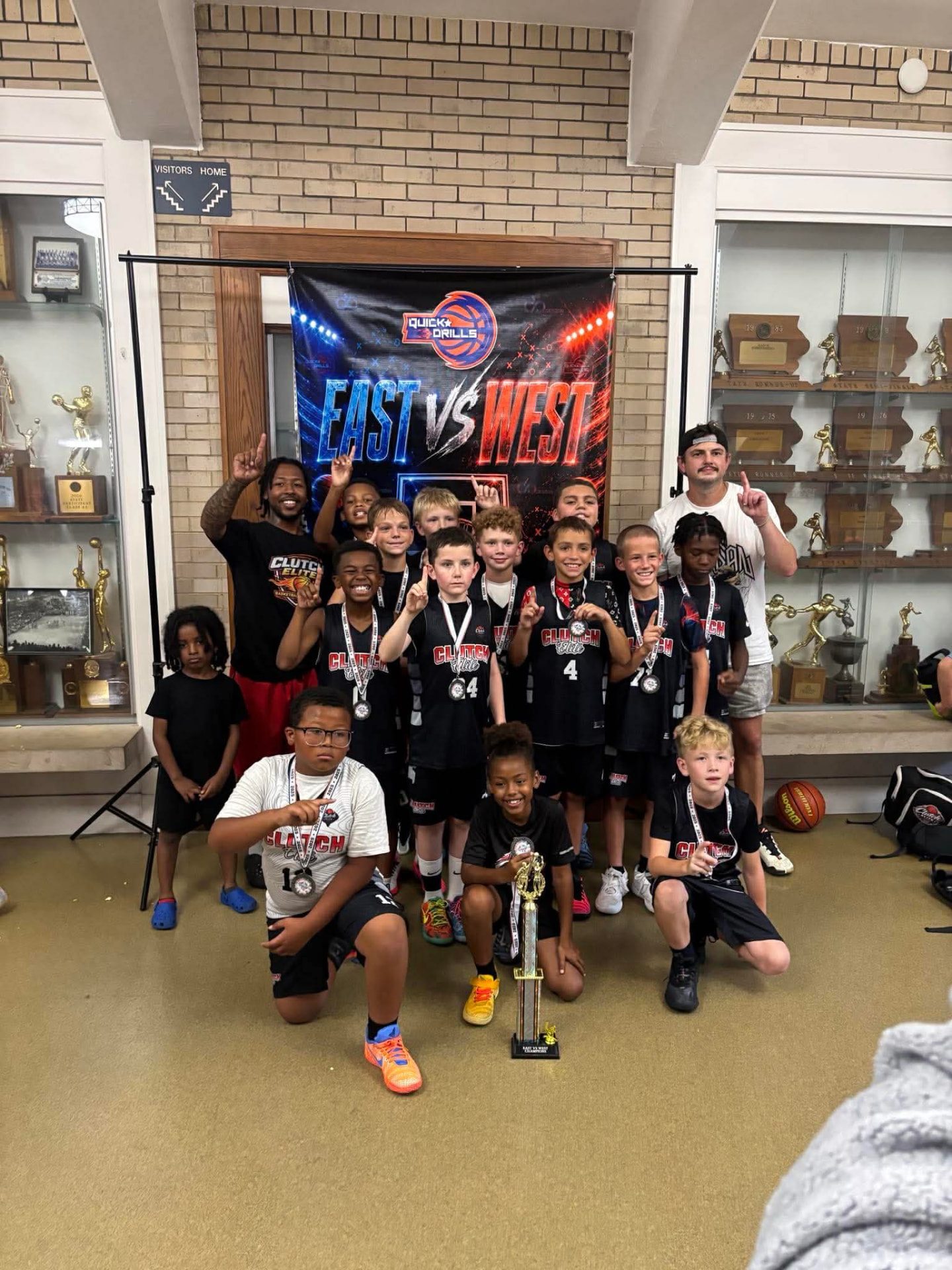 Clutch Elite team celebrating an East vs West championship